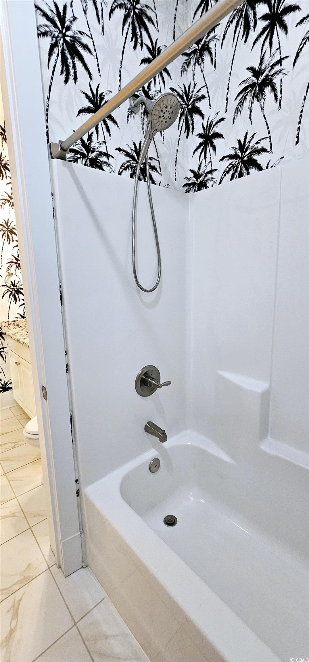 7710 Monarch Drive Myrtle Beach, SC 29572 - Photo 15 of 40 Bathroom with bathing tub / shower combination