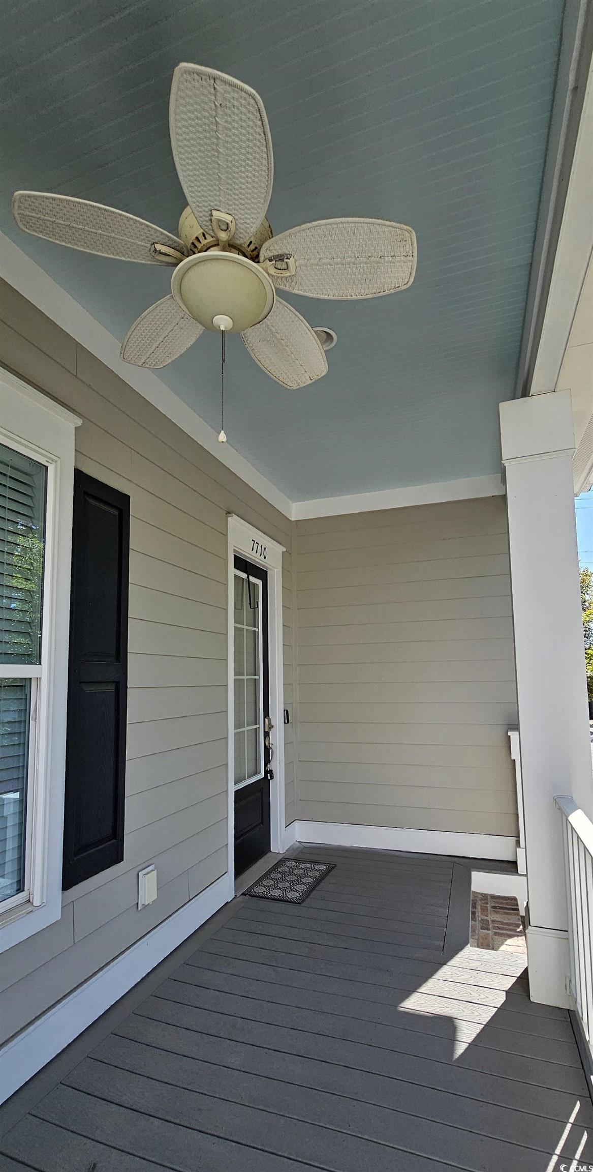 7710 Monarch Drive Myrtle Beach, SC 29572 - Photo 6 of 40 Wooden deck with a ceiling fan