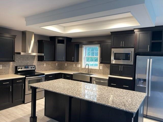 887 Mud Pike Road Smithfield, PA 15478 - Photo 19 of 36 a kitchen with granite countertop stainless steel appliances a sink stove and refrigerator