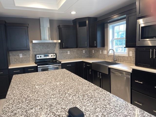 887 Mud Pike Road Smithfield, PA 15478 - Photo 21 of 36 a kitchen with a sink stove and refrigerator
