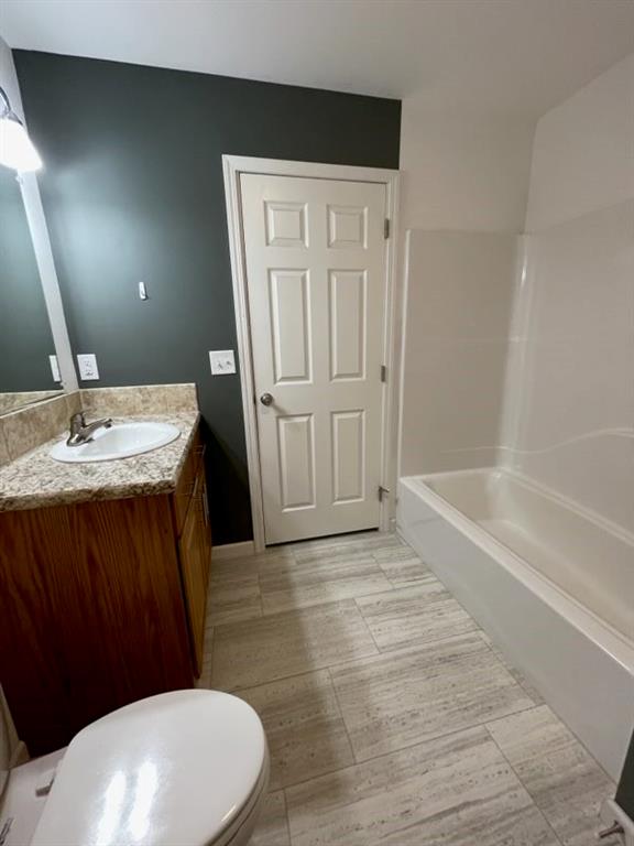 887 Mud Pike Road Smithfield, PA 15478 - Photo 36 of 36 a bathroom with a sink a toilet and bathtub