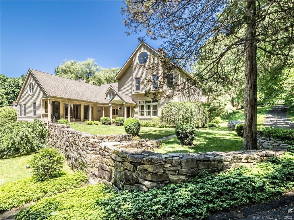 19 Limekiln Road Redding, CT 06896 - Photo 1 of 1 a front view of a house with a yard