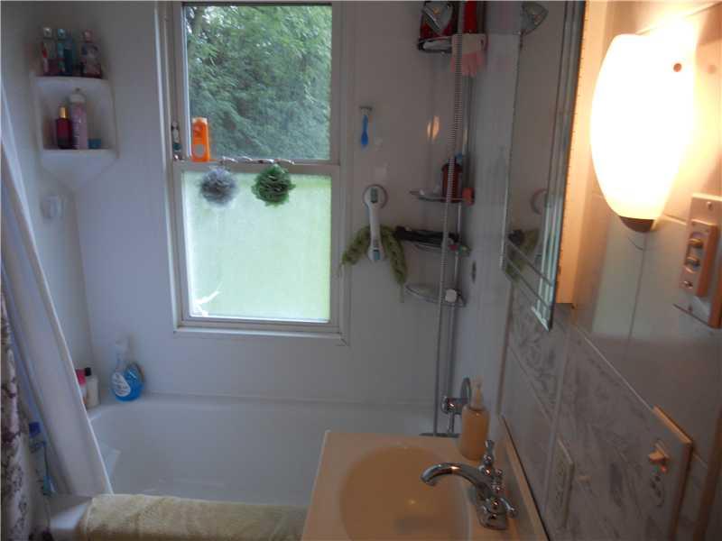 161 Spring Hill Road Aliquippa, PA 15001 - Photo 7 of 12 Full Bath. Main bath with newer tub surround.