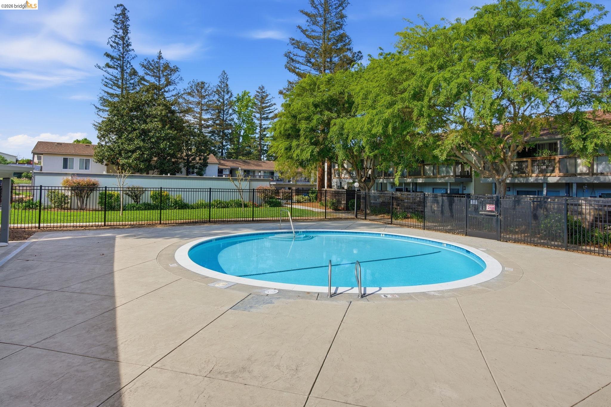 4081 Clayton Road, Unit 118 Concord, CA 94521 - Photo 25 of 30 a view of a swimming pool with a patio