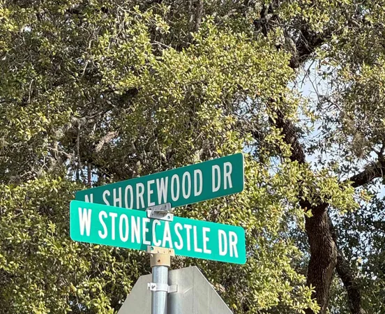 a street sign sitting on a wooden floor