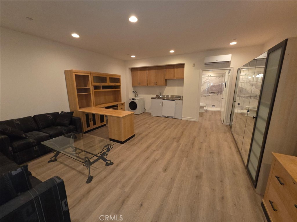14 Red Leaf Lane Ladera Ranch, CA 92694 - Photo 12 of 14 a living room with furniture and a wooden floor