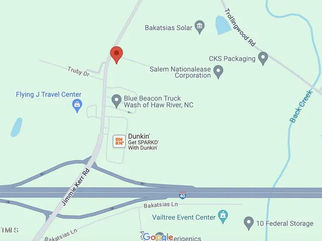 a picture of a book and a white bed