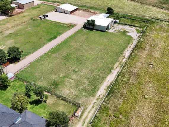 a view of a lake with a yard