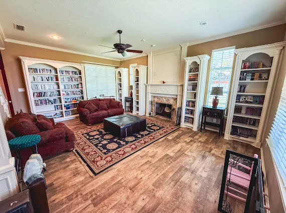 a kitchen with granite countertop a refrigerator stove top oven and sink