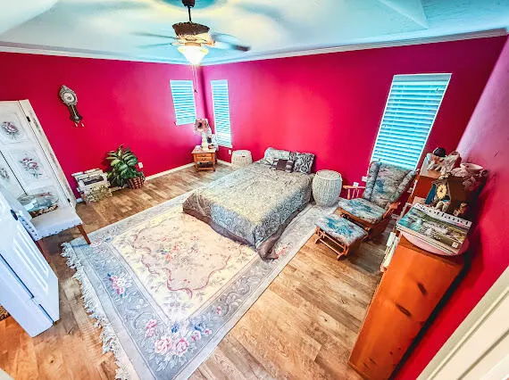 a room with furniture and a book shelf