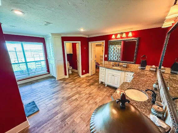 a view of entryway with stairs and wooden floor