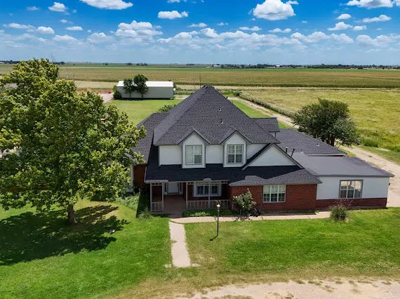 a aerial view of a house with a lake view