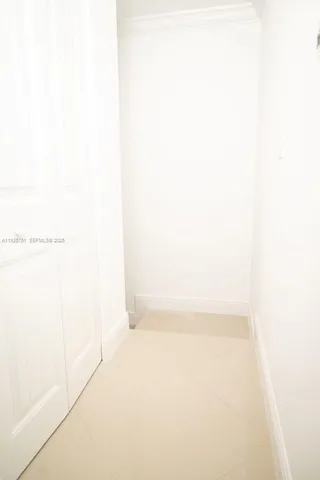 a picture of a bathroom with a shower