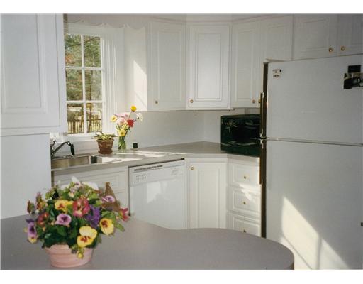 2 Old Forge Road Barrington, RI 02806 - Photo 2 of 11 Kitchen. Bright and sun-filled, the kitchen offers ample cabinets and workspace...
