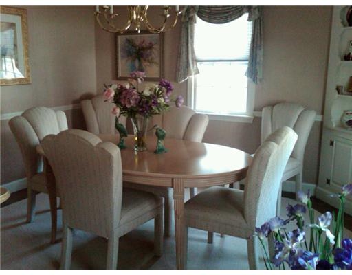 2 Old Forge Road Barrington, RI 02806 - Photo 3 of 11 Dining Room. Offering built-in corner hutch, the formal dining room is adorned with chair rail and hardwood flooring...