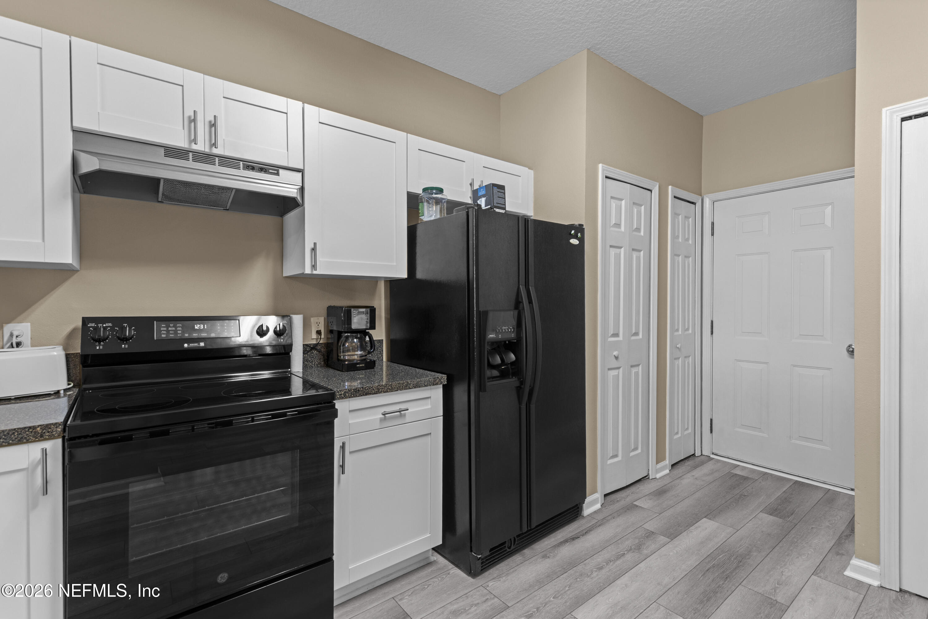 7774 Melvin Road Jacksonville, FL 32210 - Photo 10 of 32 09 Kitchen