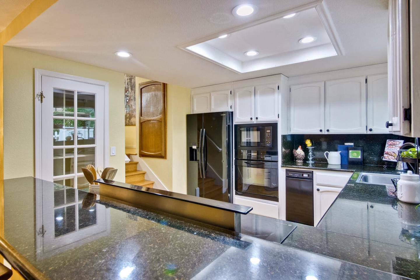 44 Holmes Drive San Jose, CA 95127 - Photo 13 of 48 a kitchen with stainless steel appliances granite countertop a refrigerator and a sink