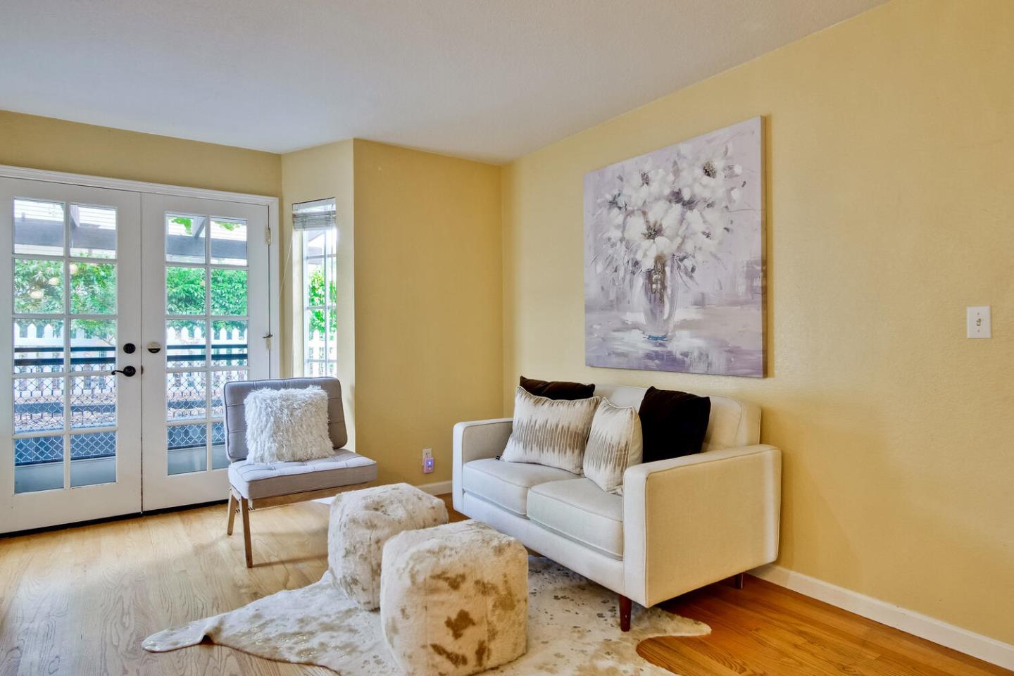 44 Holmes Drive San Jose, CA 95127 - Photo 19 of 48 a living room with furniture and a floor to ceiling window