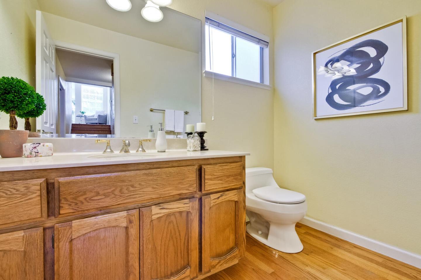 44 Holmes Drive San Jose, CA 95127 - Photo 22 of 48 a bathroom with a toilet a sink and mirror