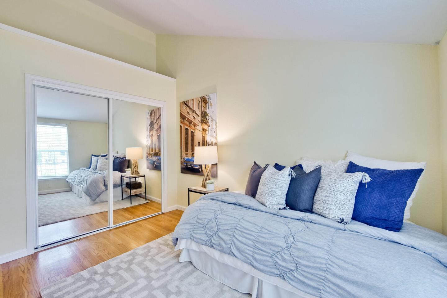 44 Holmes Drive San Jose, CA 95127 - Photo 36 of 48 a bedroom with a bed and wooden floor