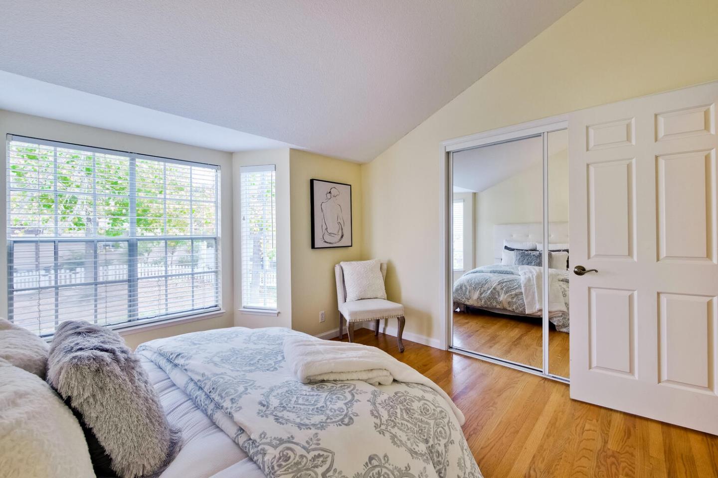 44 Holmes Drive San Jose, CA 95127 - Photo 38 of 48 a bedroom with a bed and a large window
