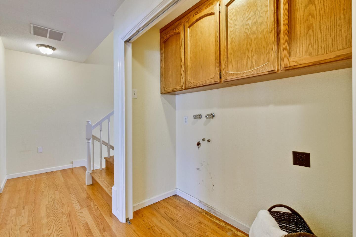 44 Holmes Drive San Jose, CA 95127 - Photo 39 of 48 a view of a room with wooden floor and cabinet