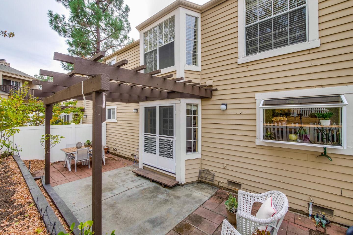 44 Holmes Drive San Jose, CA 95127 - Photo 43 of 48 a view of a patio with a chairs and table in the patio