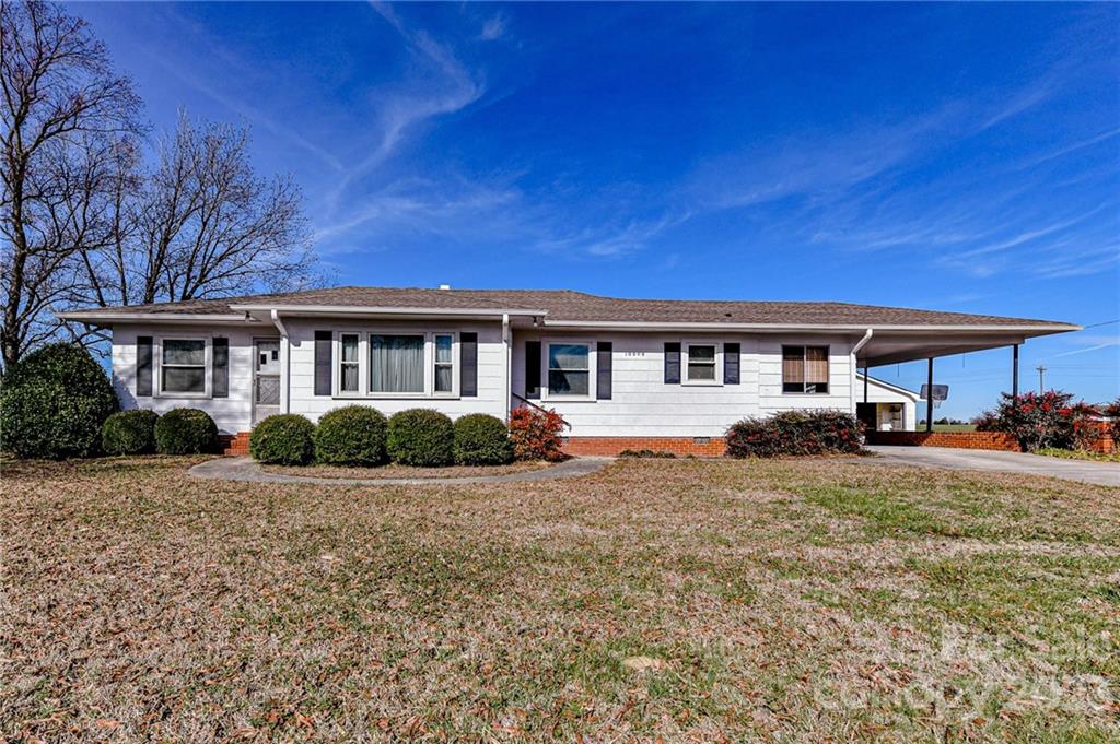 10008 Landsford Road Monroe, NC 28112 - Photo 2 of 32 a view of a house with a yard