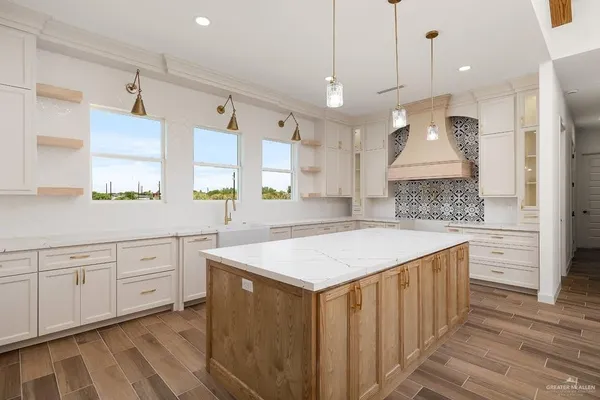 a bathroom with a bathtub and a sink