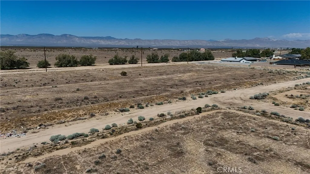 742 71st Street Edwards, CA 93523 - Photo 3 of 8 Red boundary lines on pictures are an estimate and for marketing purposes only. Buyer to verify all aspects of this property including, but not limited to utilities, assessments, boundaries, usage, access, and zoning to satisfy themselves.