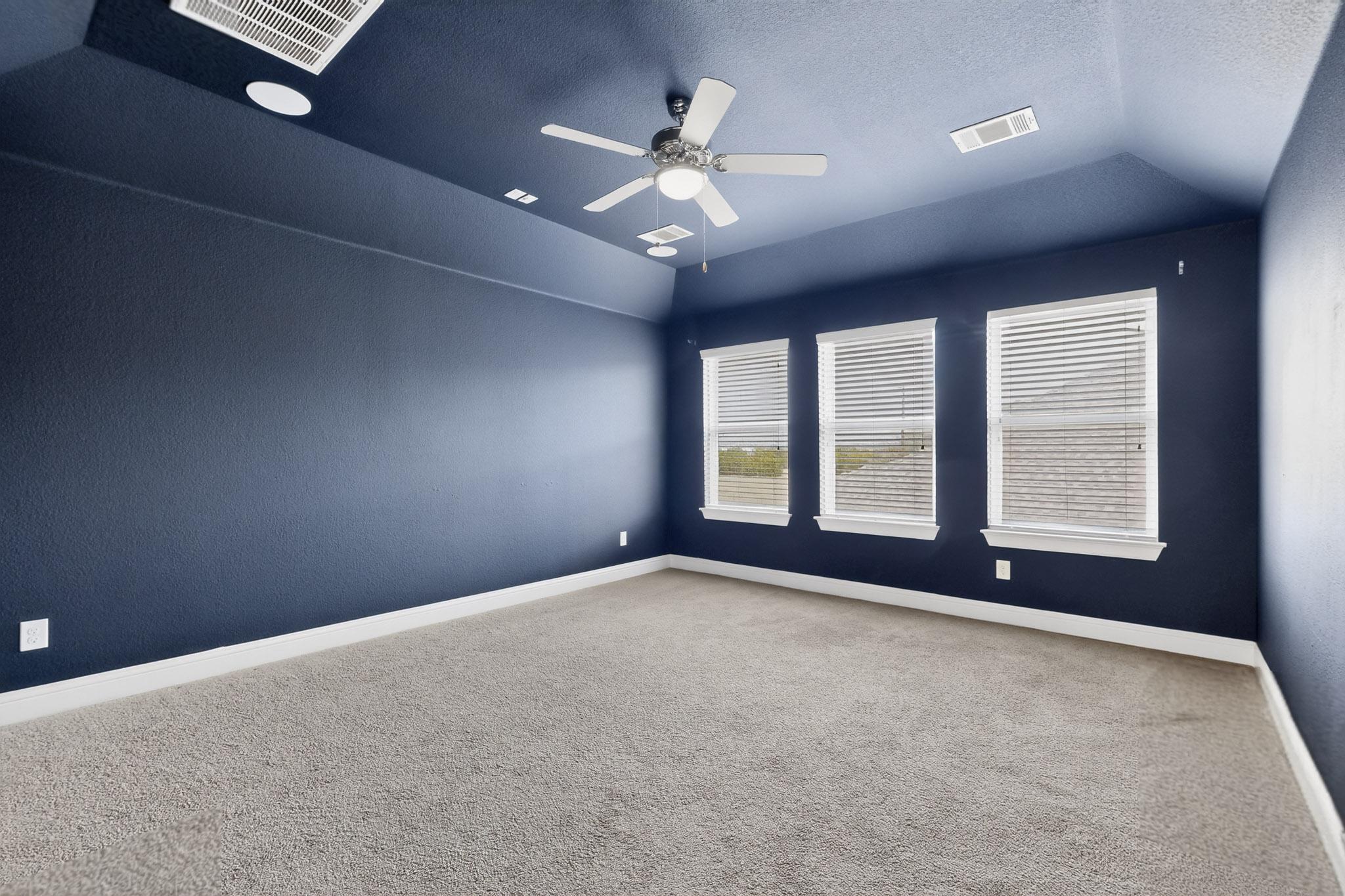 3137 Catalina Ranch Road Leander, TX 78641 - Photo 11 of 21 Spare room with a ceiling fan and carpet