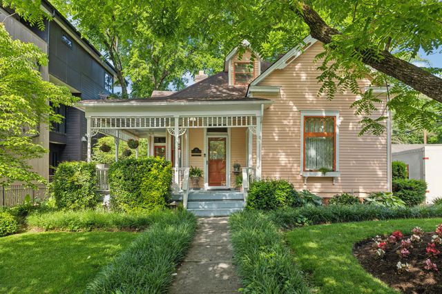 a view of a garden with a tree