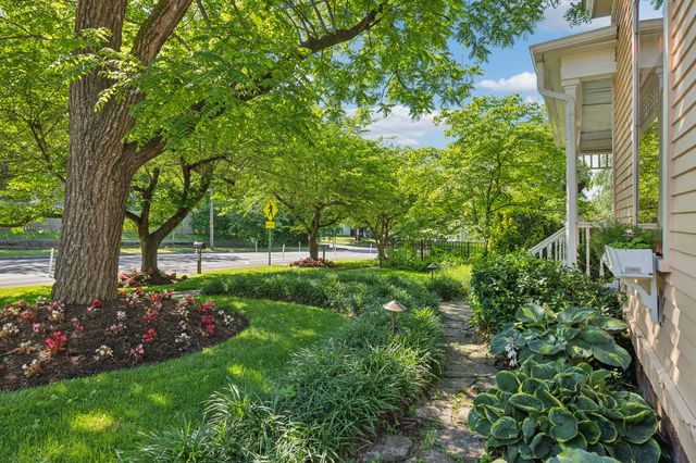 a view of balcony with furniture