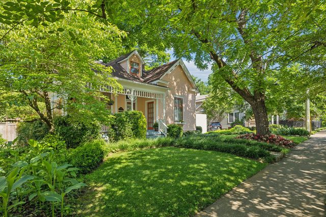 a view of a living room and dining room