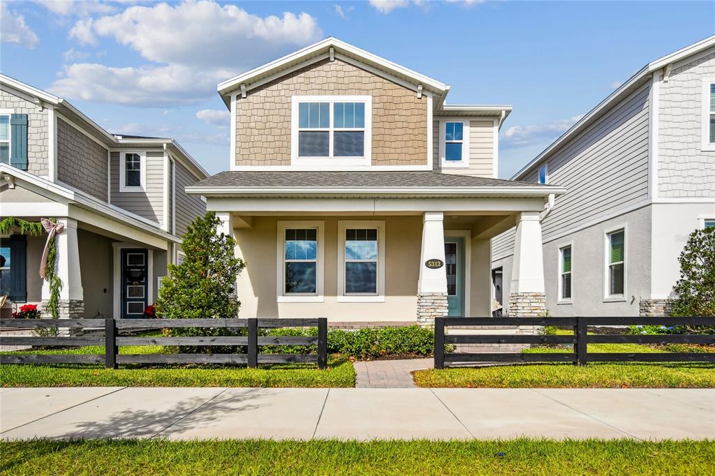 5312 Ctr Lk Rnch Boulevard St. Cloud, FL 34771 - Photo 1 of 1 a front view of a house with a yard