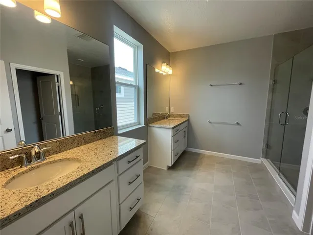 a view of a hallway with seating area