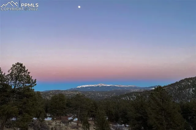 a view of a city with sunset