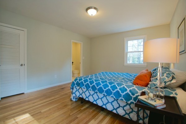 82 Herrick Road Boxford, MA 01921 - Photo 13 of 25 a bedroom with a bed and window