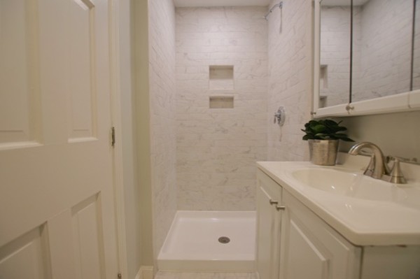 82 Herrick Road Boxford, MA 01921 - Photo 14 of 25 a bathroom with a sink and a mirror