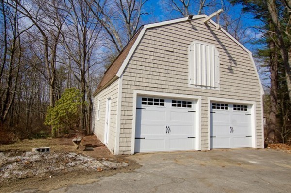 82 Herrick Road Boxford, MA 01921 - Photo 22 of 25 a view of a house with a yard