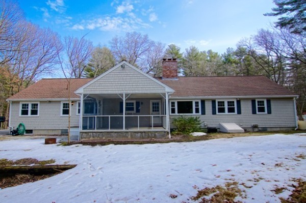 82 Herrick Road Boxford, MA 01921 - Photo 23 of 25 a front view of a house with a yard