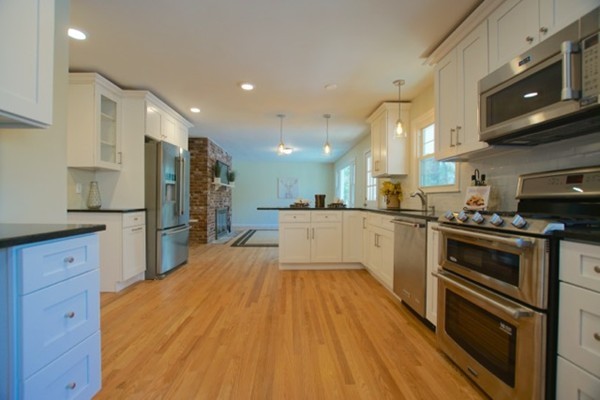 82 Herrick Road Boxford, MA 01921 - Photo 5 of 25 a large kitchen with stainless steel appliances