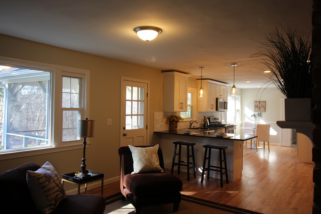 82 Herrick Road Boxford, MA 01921 - Photo 6 of 25 a dining room with furniture and wooden floor