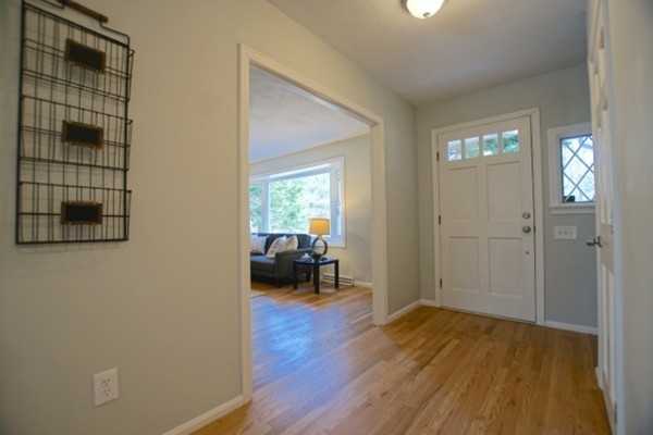 82 Herrick Road Boxford, MA 01921 - Photo 8 of 25 a view of livingroom with workspace and couch
