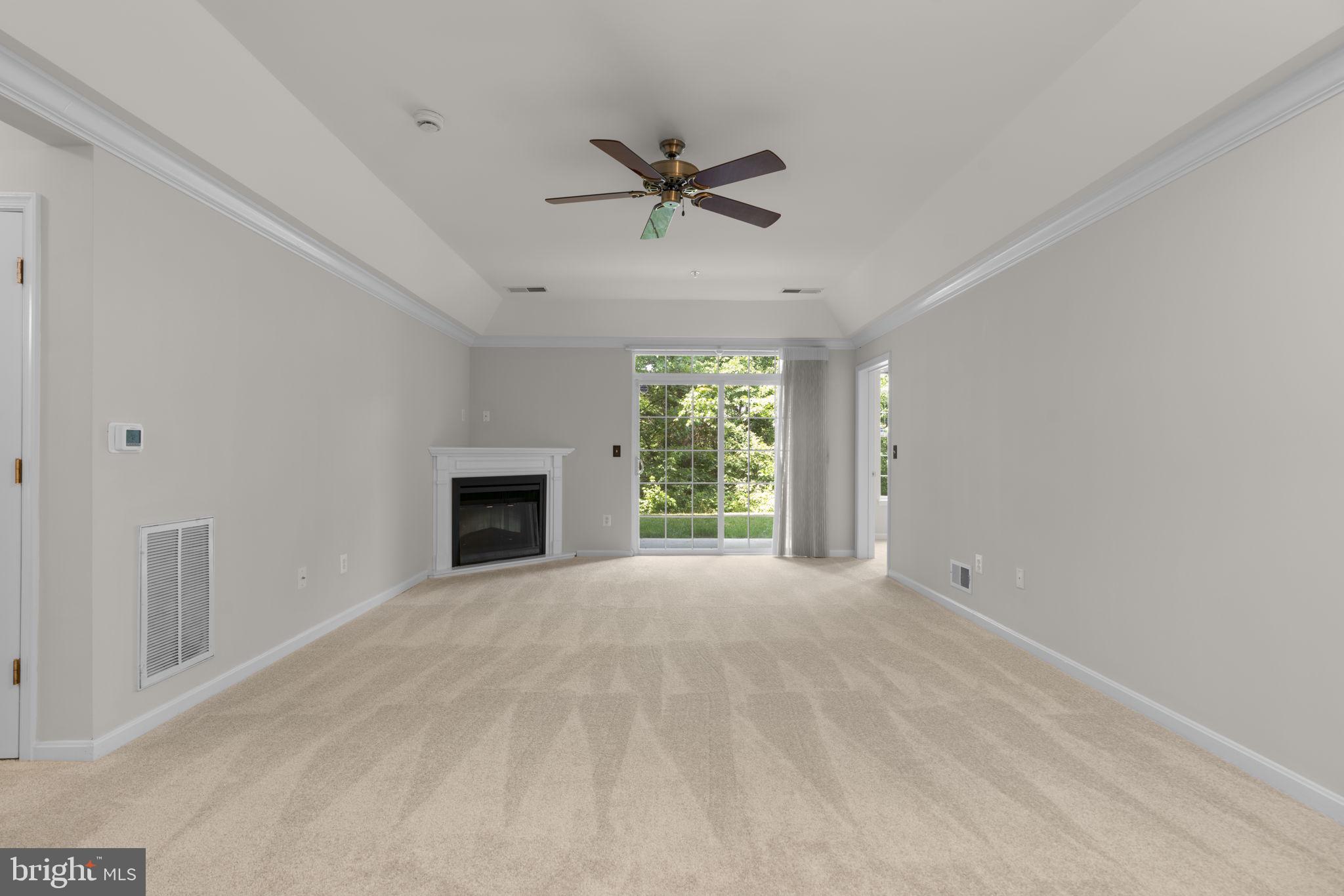 7315 Maplecrest Road, Unit 104 Elkridge, MD 21075 - Photo 11 of 58 a view of an empty room with a window