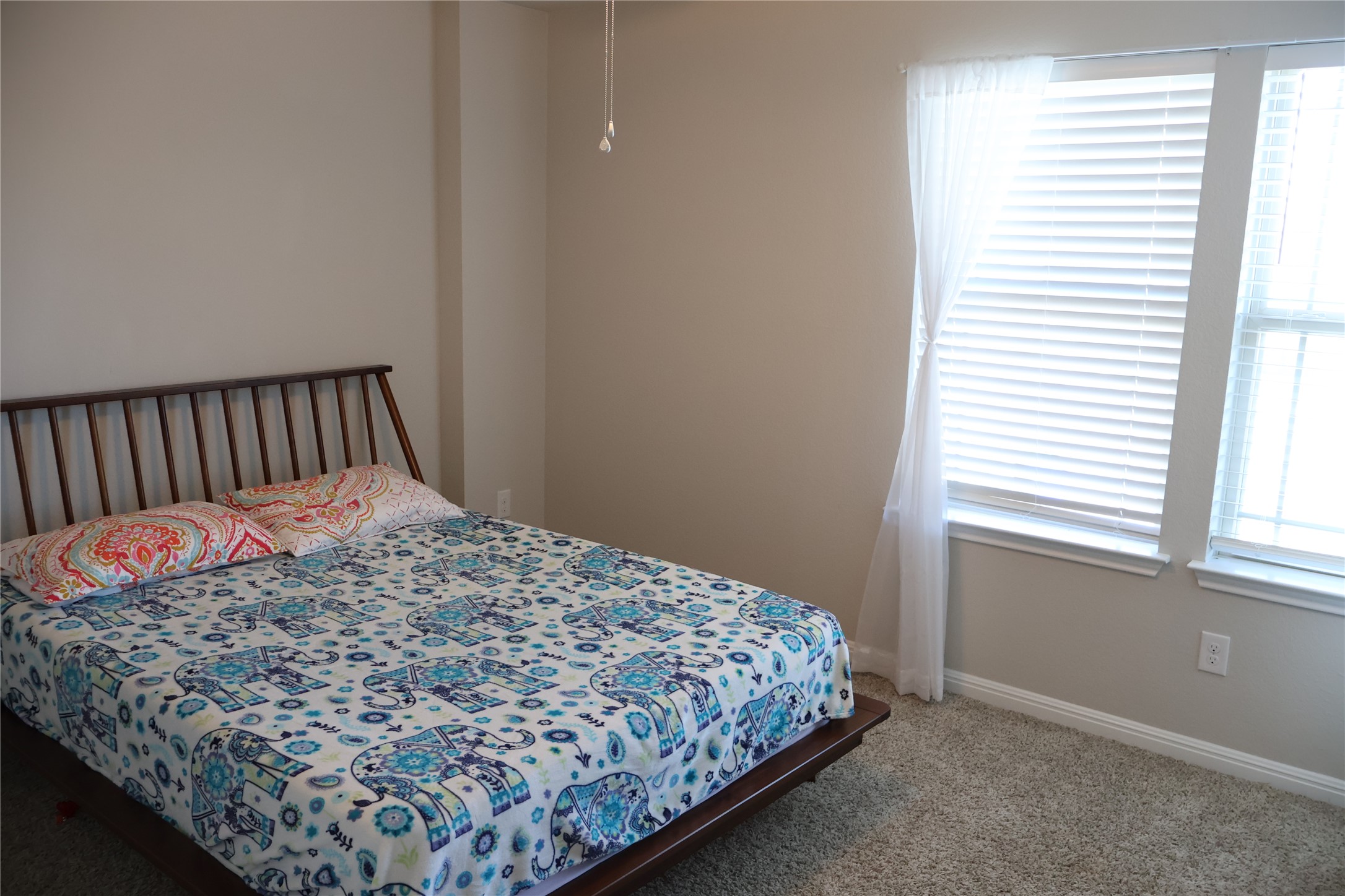 11500 Maple Leaf Way Manor, TX 78653 - Photo 28 of 29 Carpeted bedroom with baseboards