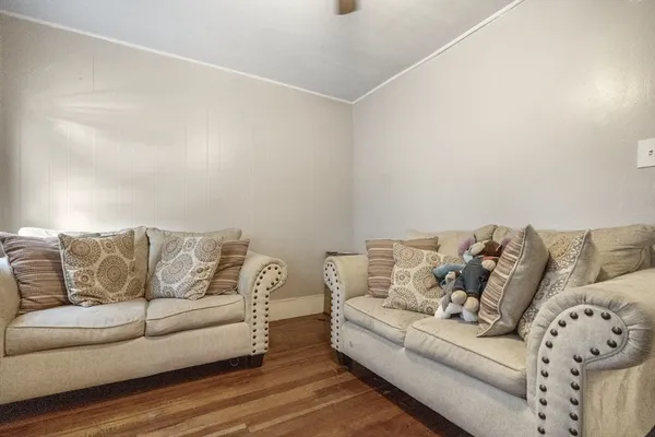 a living room with furniture and a couch