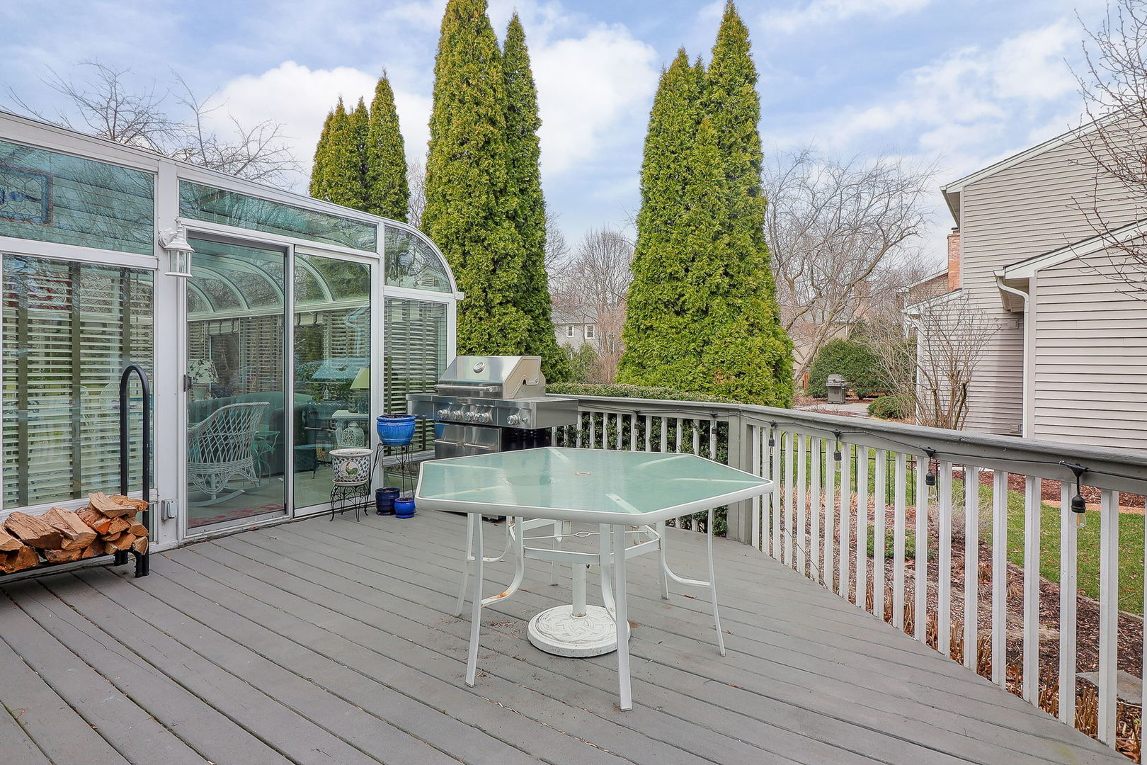 523 Cassin Road Naperville, IL 60565 - Photo 24 of 26 a view of balcony with wooden floor and outdoor seating