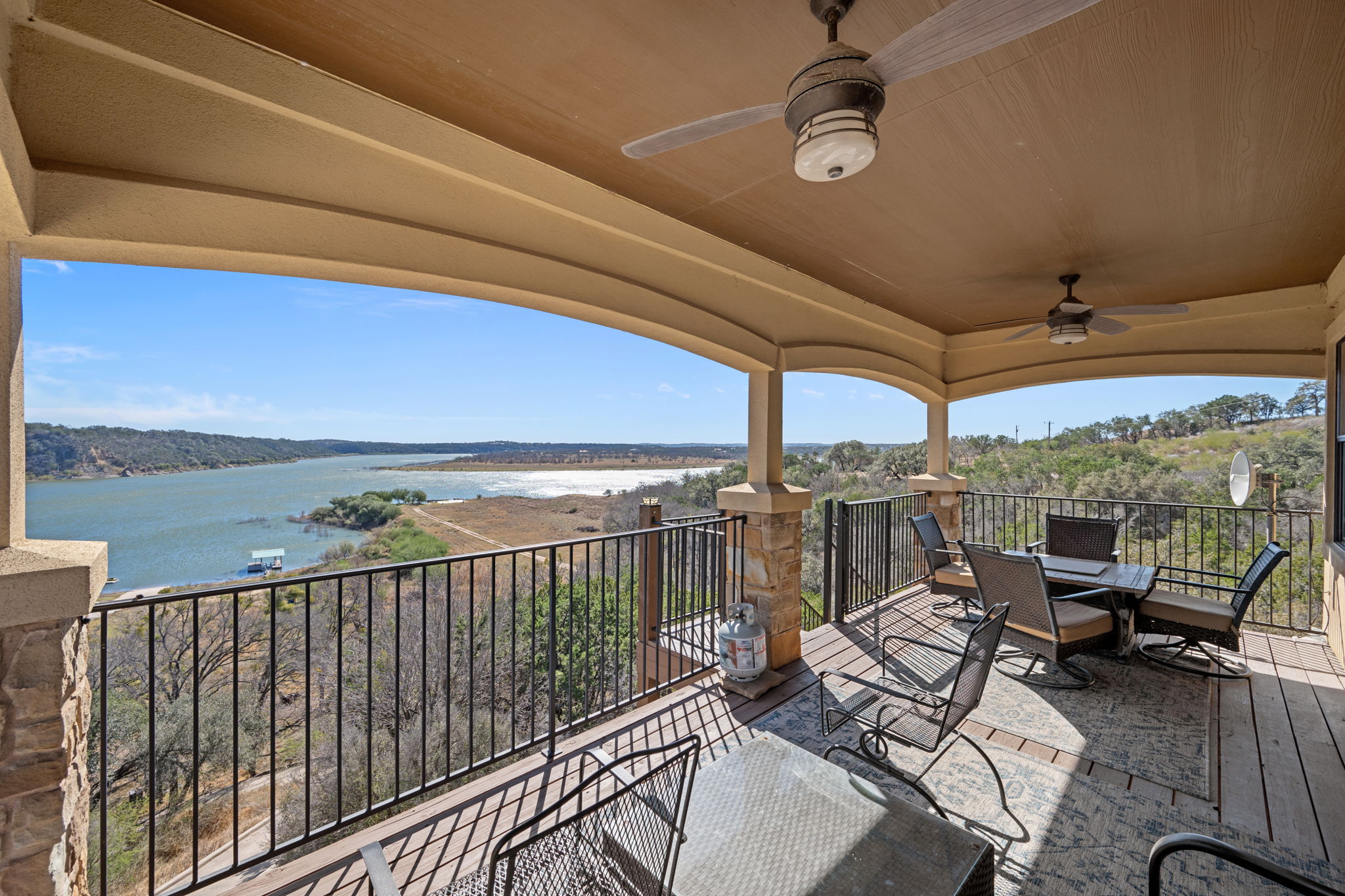 1690 Hickory Creek Road Marble Falls, TX 78654 - Photo 16 of 25 View of patio / terrace with a ceiling fan and a water view
