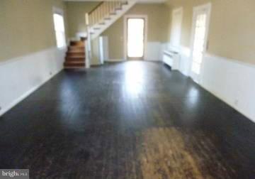 4763 Winchester Road The Plains, VA 20198 - Photo 7 of 12 wooden floor in an empty room with a window